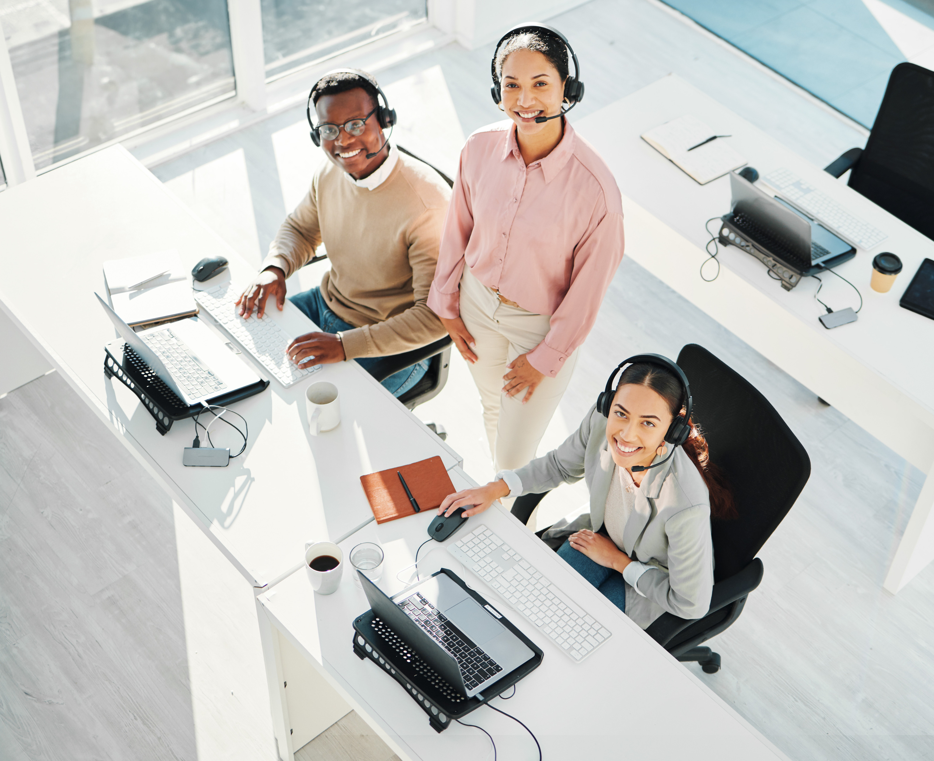 Customer service representatives with headsets